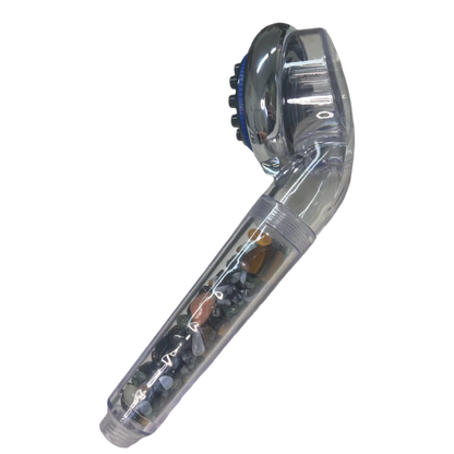 Pommeau de douche côté avec pierres dans le manche